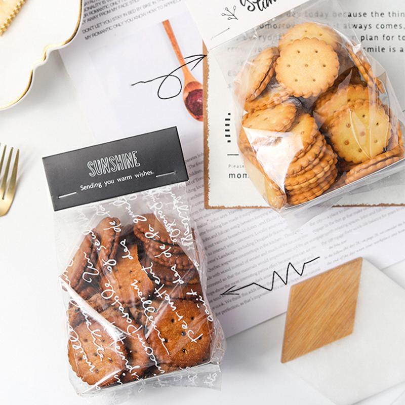 

50pcs Wedding Candy Cookie Gift Bag Self Stand Holder Cupcake Biscuit Handmade Christmas Plastic Packaging Bags