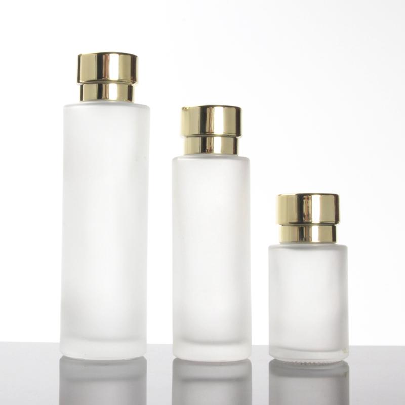

20ml Clear Frosted Cosmetic Toner Bottle with Gold Lid