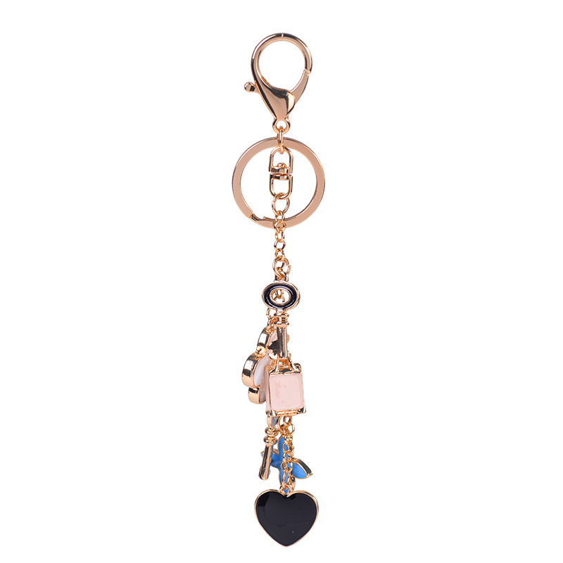 

Good Luck Clover keychains Fashion Brands Key Chain Flower Keyrings Metal Key Ring Women Bag Charm Pendant Car Accessories