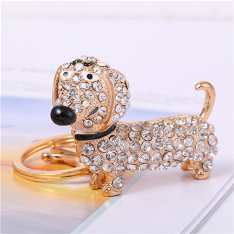 

Fashion creative rhinestone sausage alloy keychain Skeleton dog car keychain Cute puppy bag pendant Female jewelry