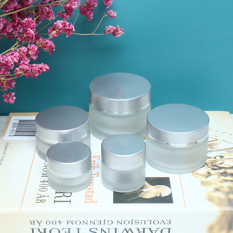 

Hot Sale 5/10/15/20/30/50/100g Frosted Glass Cream Jar Cosmetic Container Cosmetic Jars Silver Lid Glass Bottle New Arrival