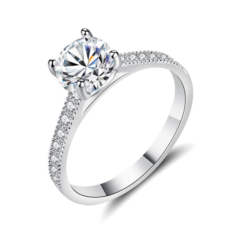 

Fashion Korean Version of The Simple Four-claw Round Ring Creative Jewelry Micro Inlaid Zircon Ring Couple Gift