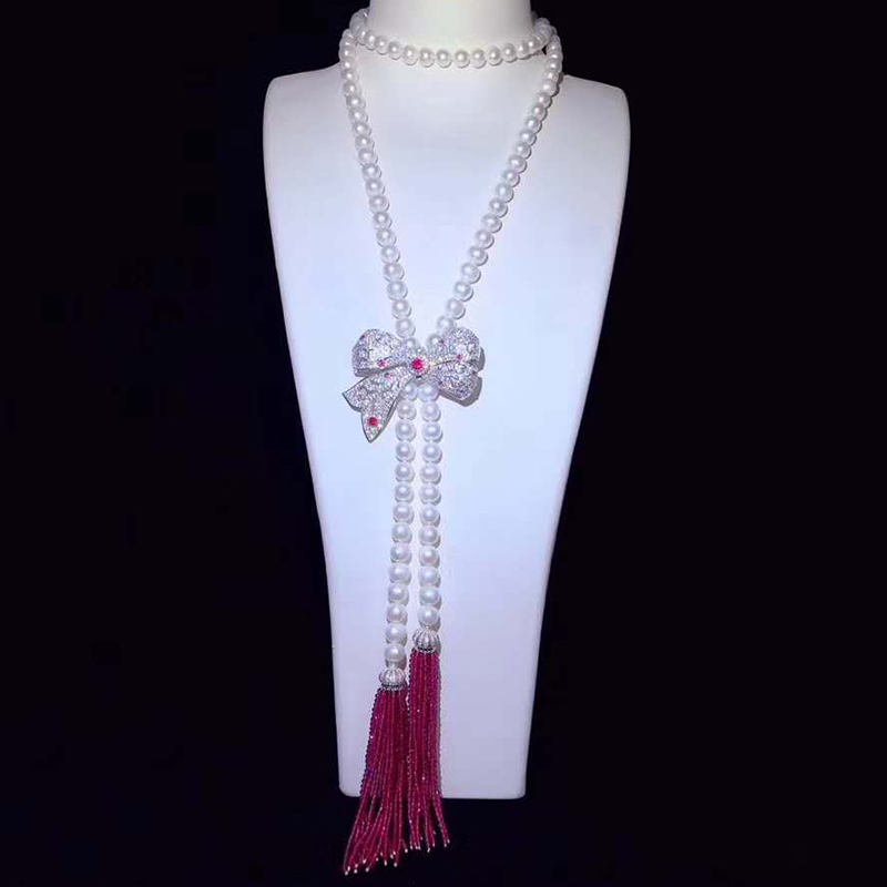 

42" White Pearl Bowknot Tassel Necklace CZ Pendant
