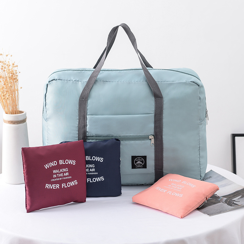 

Portable folding waterproof travel home shopping storage bag