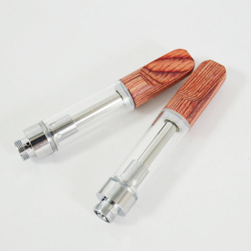 

Wood Mouthpiece TH105 TH210 Dabwoods Ceramic Coil Vaporizer Extract Oil Cartridges 510 Disposable Vape Tank for Thick Oil .5ml 1ml