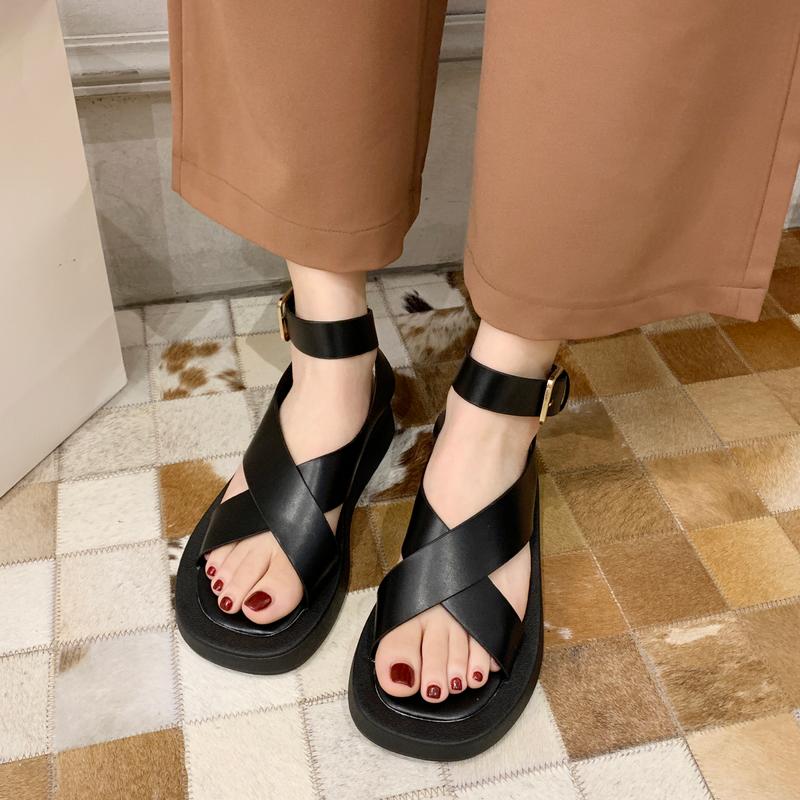 

Summer 2021 new muffin thick bottom black comfortable sandals flat bottomed Roman ins cross belt sandals fashion, See chart