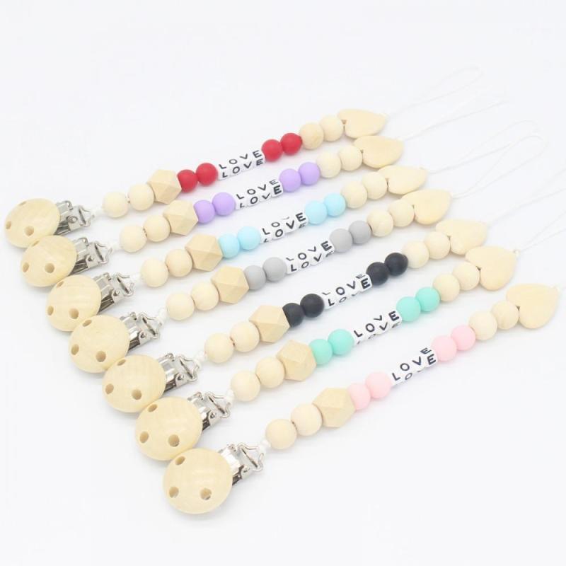 

Infant Newborn Feeding Teether Holder Personalized Wooden Beads Aceesories Baby Pacifier Clip Chain Soother Nipple Holder1