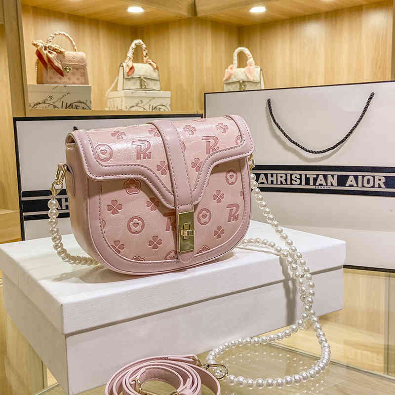 

2022 Factory Wholesale handbag female summer sweet embossed saddle bag pearl chain Portable Single Shoulder Bag, White