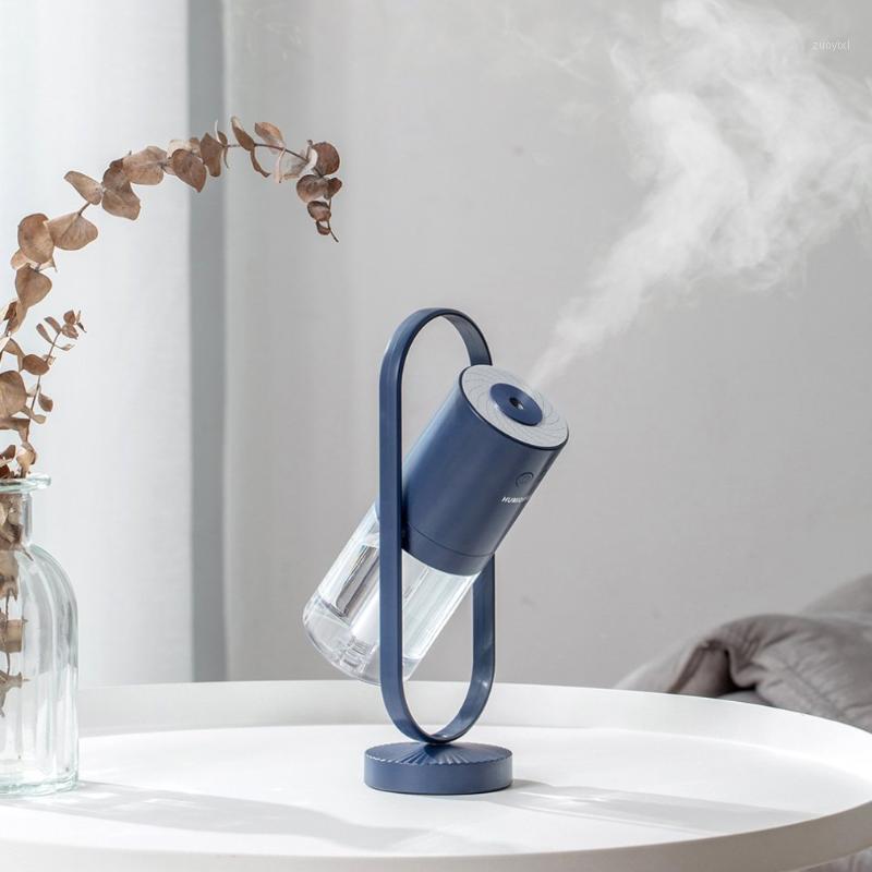 

Creative Desktop Mini Silent Night Light Atomizer Portable Negative Ion Household Humidifier Convenient1