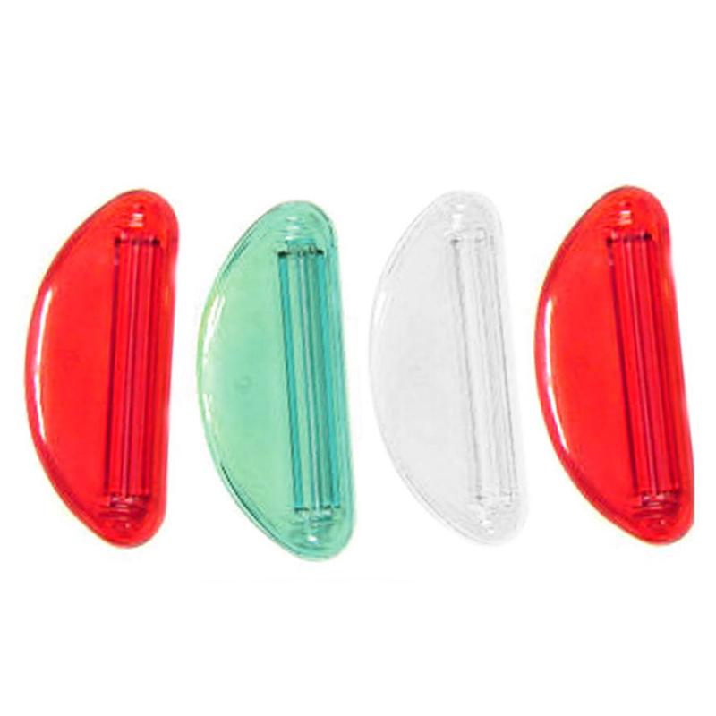 

New 4 pcs Plastic Tube Squeezer Toothpaste Dispenser Holder Rolling Bathroom Extract