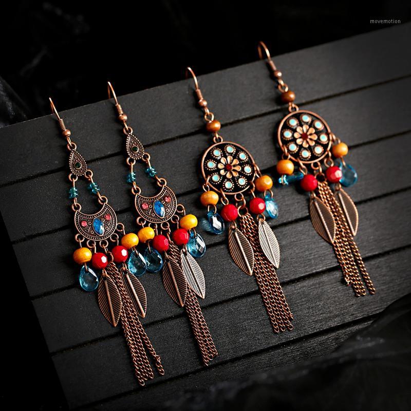 

2020 Women's Geometric Bronze Long Chain Tassel Jhumka Earrings Bohemia Flower Tibetan Earrings Oorbellen1