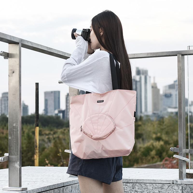 

Spinning Folding Handbag Waterproof Travel Storage Bag Single Shoulder Shell Bag Luggage Wholesale Customization
