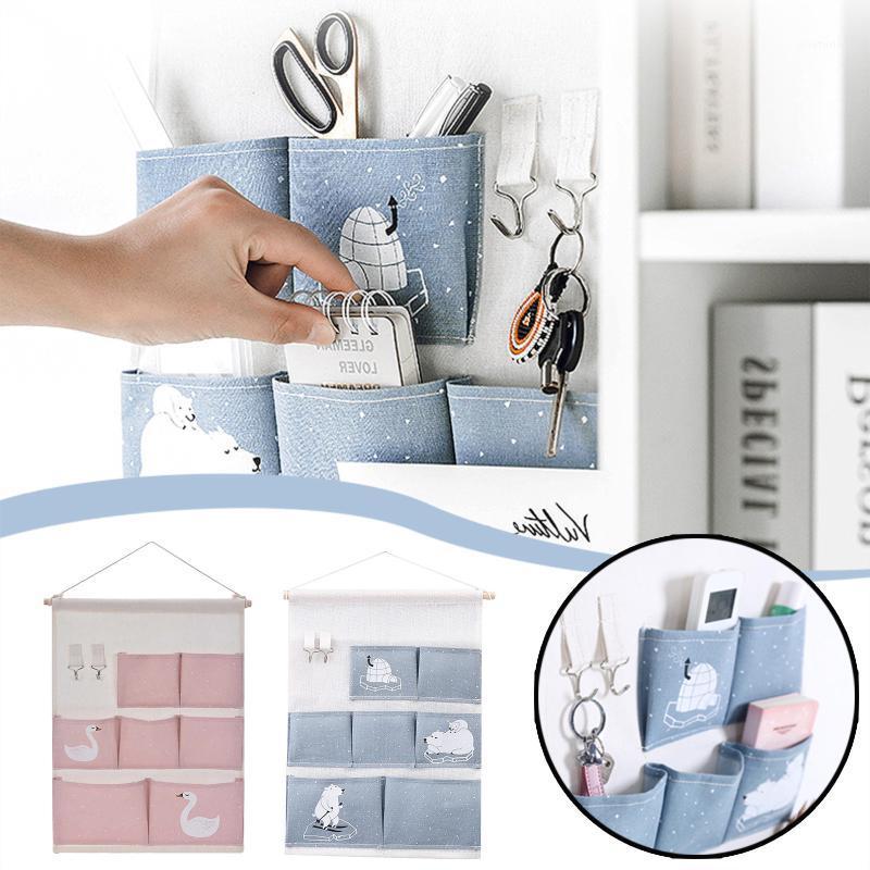 

Seven Pockets Cotton Linen Storage Bag Waterproof Plaid Wall Door Closet Hanging Storage Bag Home Organizer1