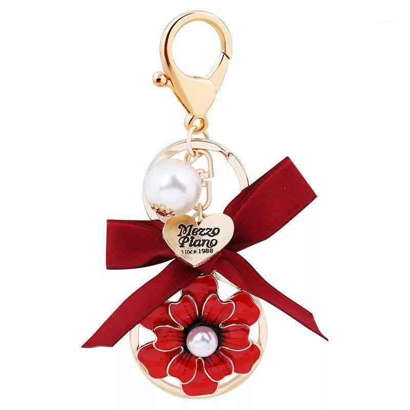 

New Handmade Bow Camellia Keychain Fine Beauty Bag Pendant Accessories Pearl Flower Car Key chain Charm Accessories keyring1