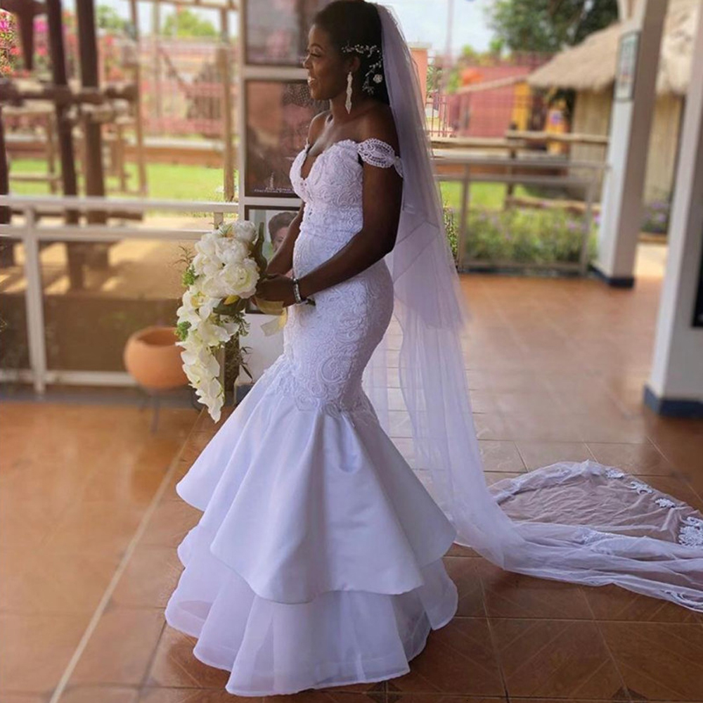 

2021 New Arrival in Africa Design Off the Shoulder An Elegant Wedding Dress Plied with Birdless Layers Dressed As a Novia Y9IC, Ivory