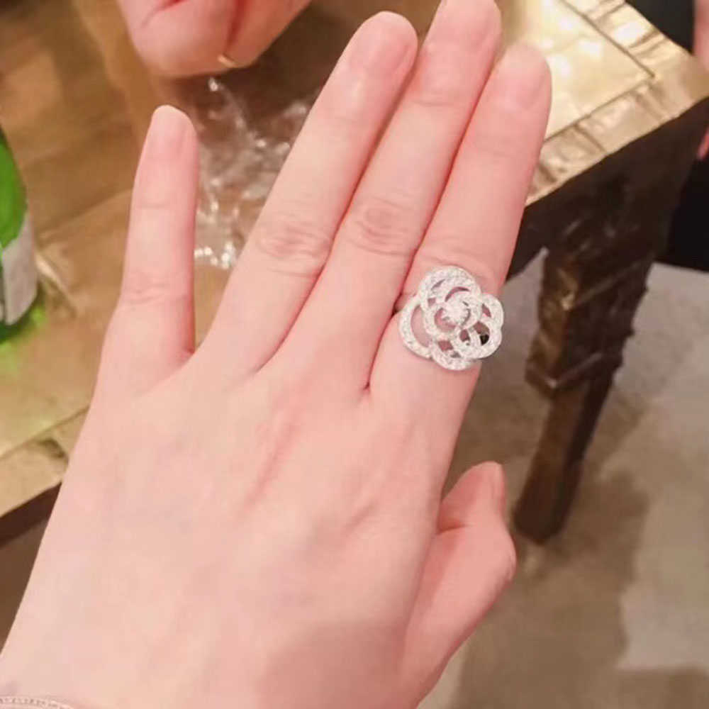 

Fashion Luxury Hollow Camellia Ring Women039s S925 Sterling Silver Fine Jewelry Popular Brands In Europe Party Shine 2022NEW RI