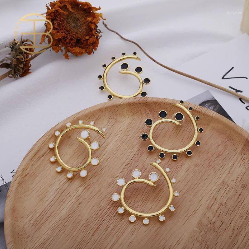 

2020 Black White Enamel Spiral Geometric Shaped Gold Stud Earrings Women's Street Style Hollow Gold Statement Earring1