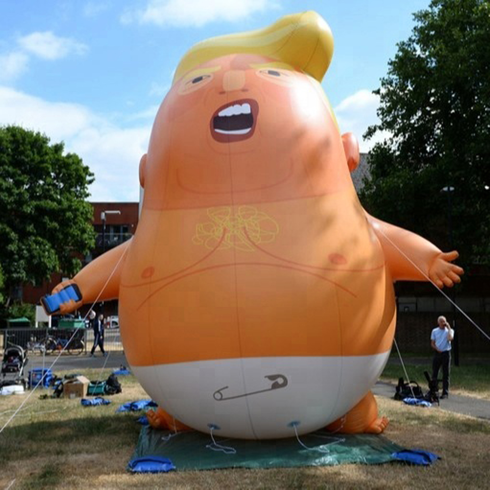 Customized outdoor giant standing cartoon inflatable trump baby advertising character for event parade decoration-image-710035518