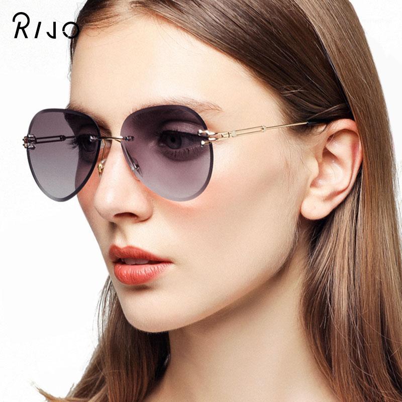 

2020 new women's frameless sunglasses ladies gradient fashion sunglasses cut lenses ladies frameless glasses UV400 metal high qu1