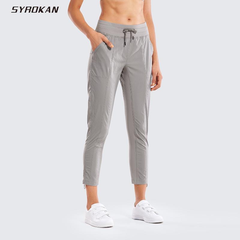 

SYROKAN Women's Go to Studio Joggers Striped Pants Tapered Leg Sweatpants with Pockets -27Inches, True navy03