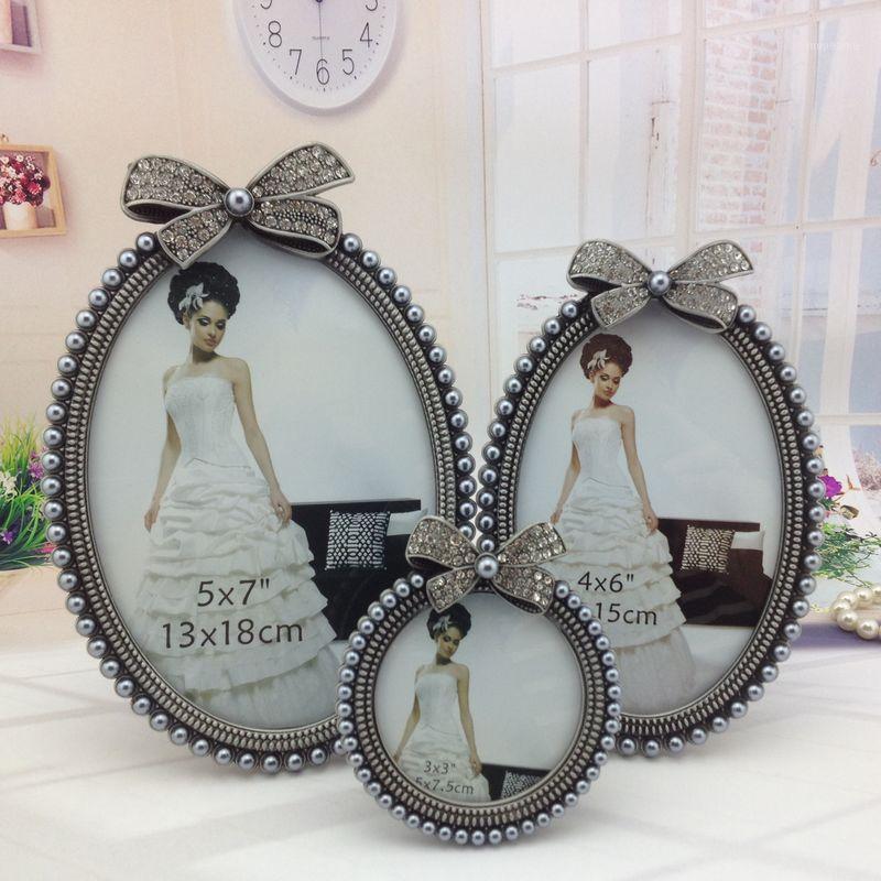 

Europe style Frame on Table Home Decoation Photo Picture Frames 5x7 4x6 3x3 Round Oval Frame Set for Baby1