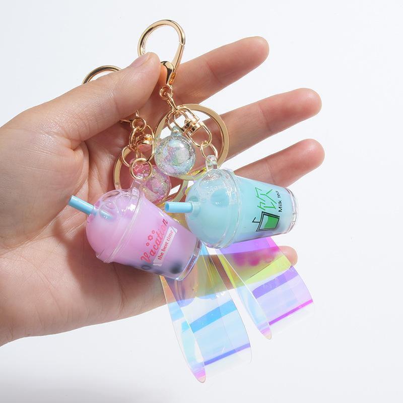 

Creative Cute Fruit Milk Keychain Liquid Pearl Milk PVC Keyrings for Women Bag Pendant Car Key Holder Decoration