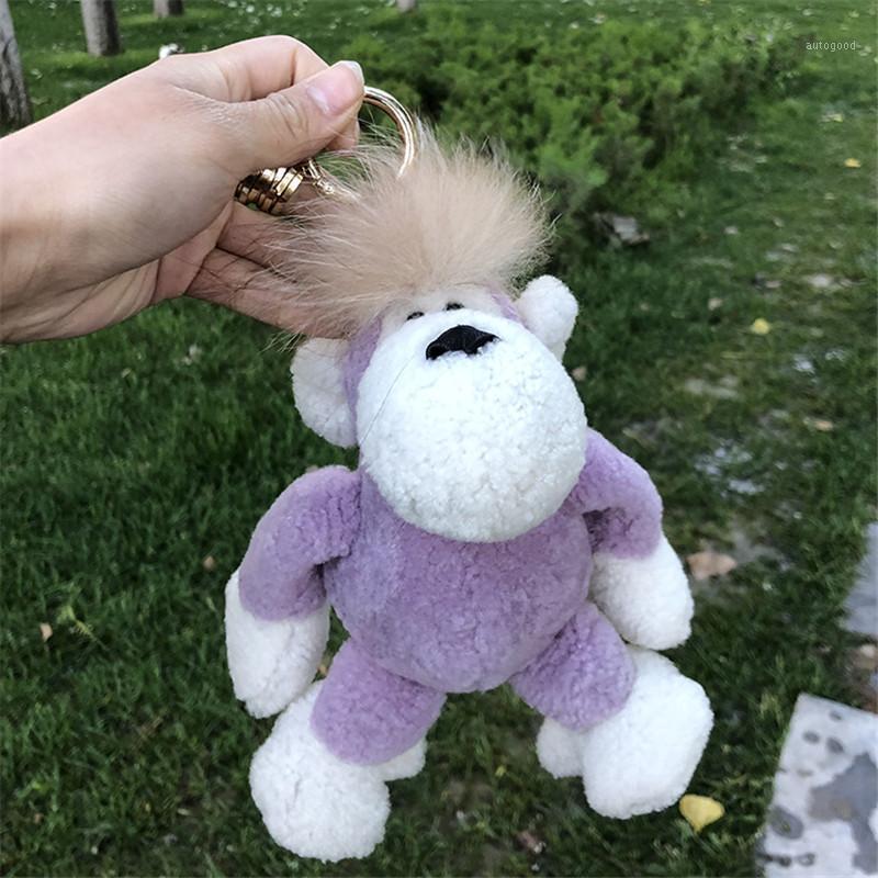 

Keychains 20CM Leather Real Wool Fur Pendant Cute Orangutan Women Backpack Charm Keyring Car Decoration Key Chains1