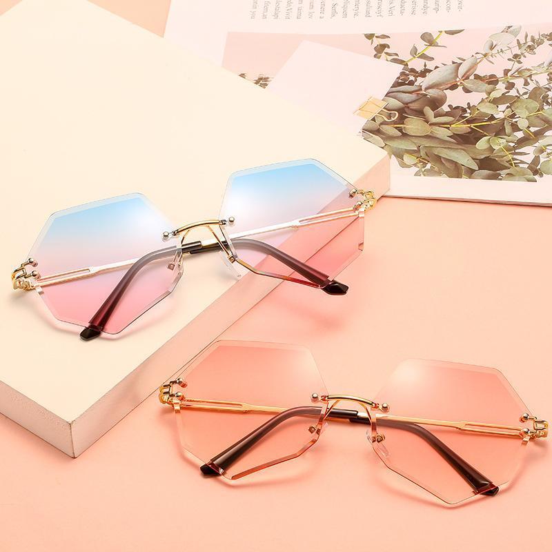 

2020 Fashion Brand Designer Rimless Sunglasses Women Vintage Sexy Lady Cutting Lens Gradient Round Sun Glasses For Female UV4001