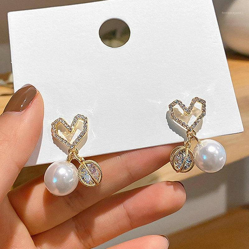 

Stud River Charm Women Zirconia Heart Design Studs Earrings Small Pearls Earring Female Fashion Jewelry1