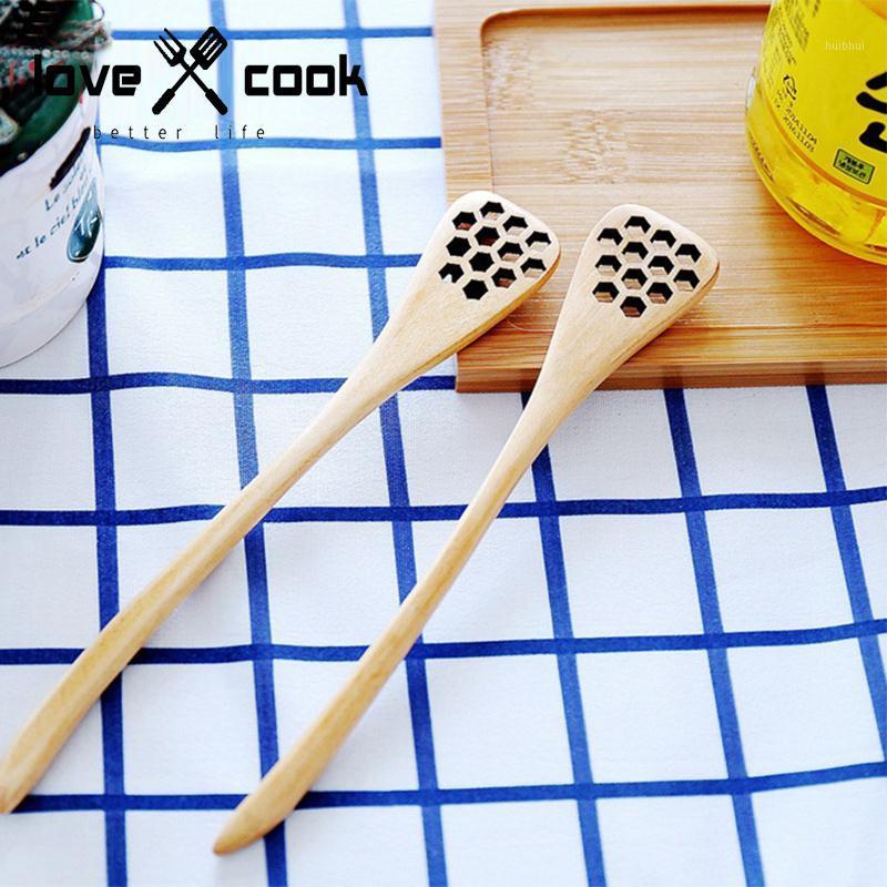 

Wholesale- Convenient faveolate Wooden Honey Spoon Stick for Honey Jar Long Handle Mixing Stick hot selling1