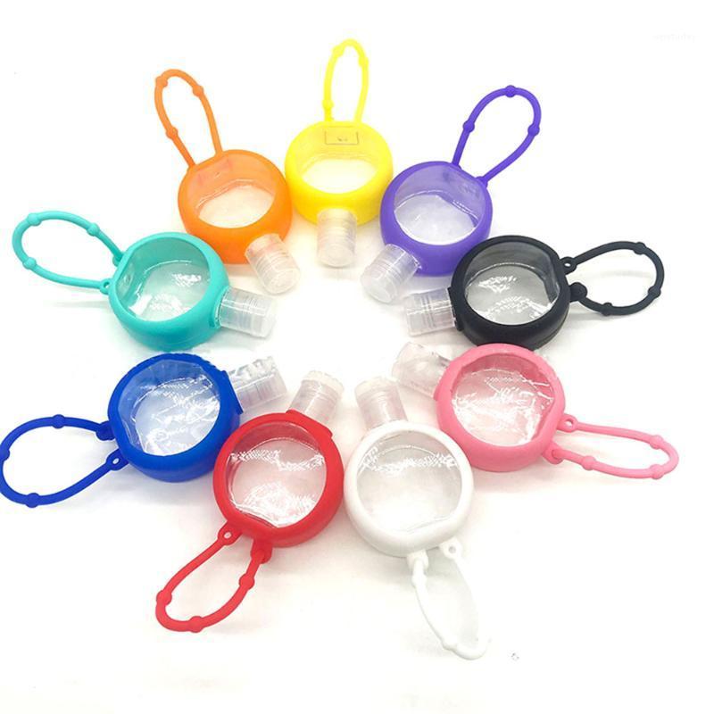 

Round Solid Color Silicone Baby Shower Hand Sanitizer Bottle Holder Portable Refillable Bottle Cosmetic Container With Key Ring1