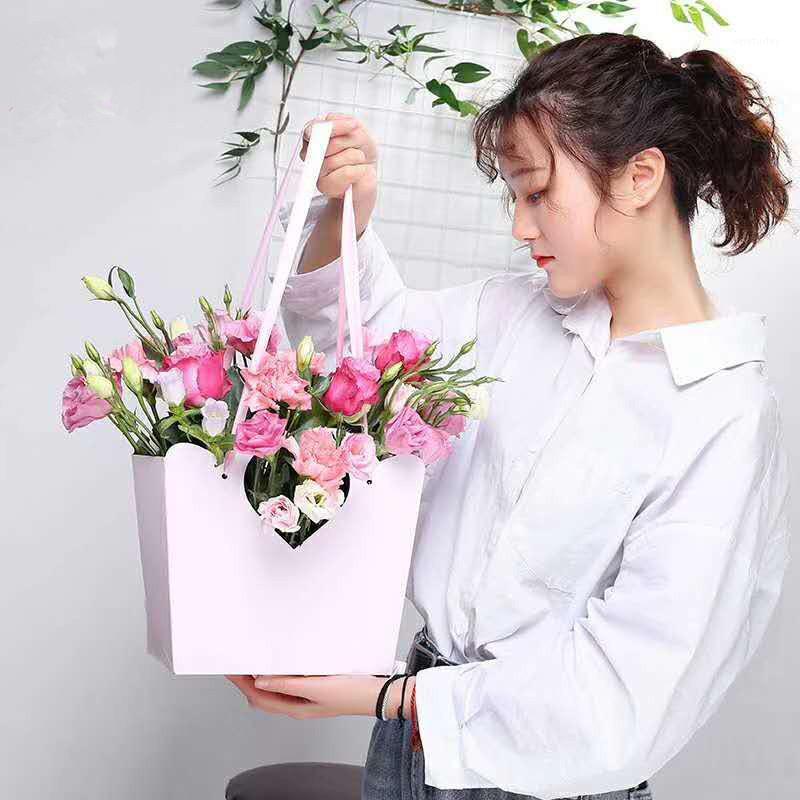 

5pcs Flower Paper Box Gift Packaging Bag Thickening Waterproof Kraft Handbags Hollow Out Heart-shaped Wedding Bouquet Pochette1
