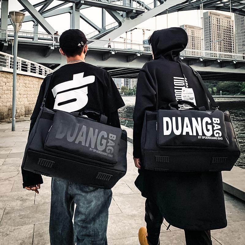 

new trendy brand large capacity one-shoulder messenger bag portable female sports gym bag short-distance travel travel1, Black and white lett
