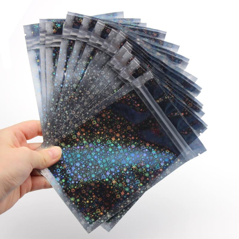

New Arrival Empty Glitter Star Holographic Packaging Bags Bulk 50 Pieces Custom Private Label One Pair Eye Lash Packaging Bags