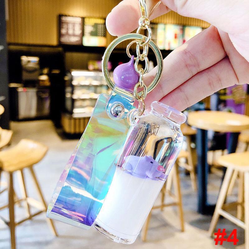 

Pig Milk Bottle Keychain Floating Creative Cute Moving Liquid Quicksand Drift Bottle Keyring For Women Bag Pendant Accessories1