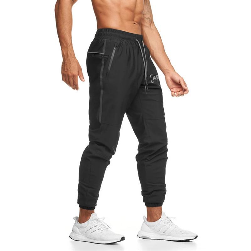 

New Autumn Men's Trousers Bodybuilding streetwear Sports Pants joggers Sweatpants Men Reflective letter printing fitness pants, White