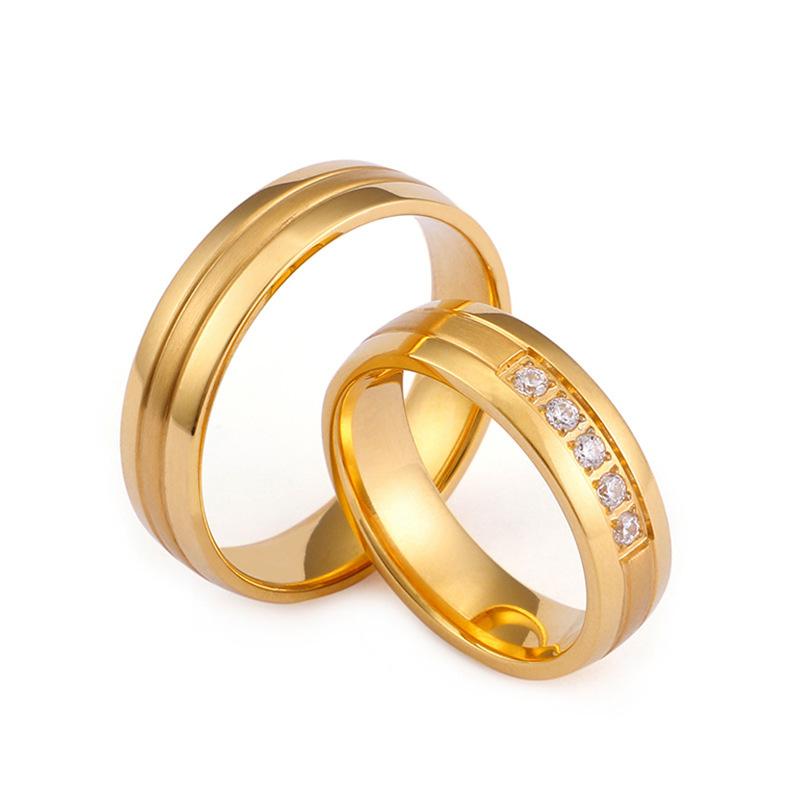 

Japanese and Korean titanium steel new star street shot golden frosted micro inlay couple ring gold inlaid five ring