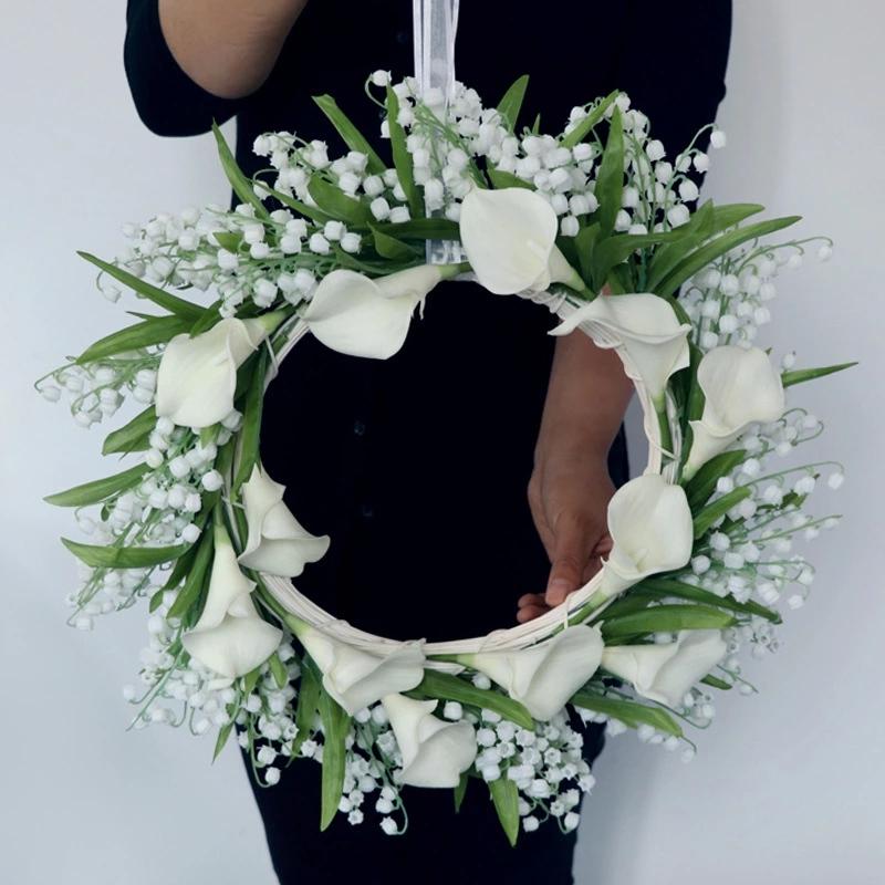

In the spring of 2021 popular white calla lily simulation indoor try to decorate cane wall coverings, As pic