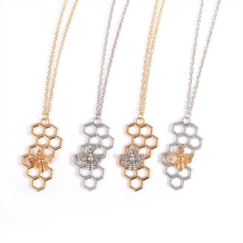 

Hot selling fashion and simple honeycomb honeycomb pendant in Europe and America, bee insect necklace jewelry