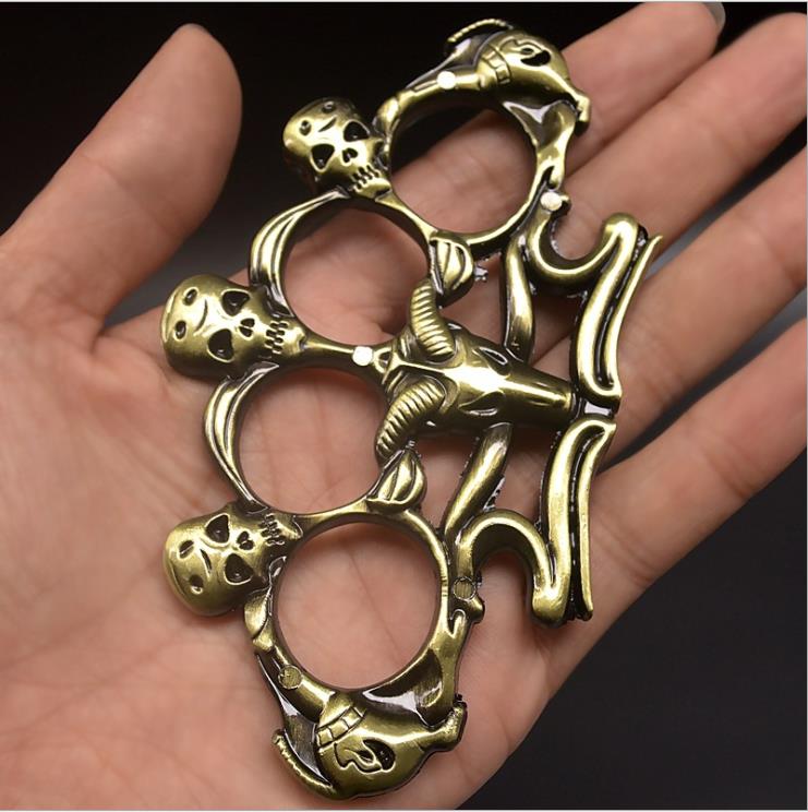 

21 Self-defense weapon sheep skeleton hand support iron four-finger tiger finger buckle ring festival hand buckle martial arts81