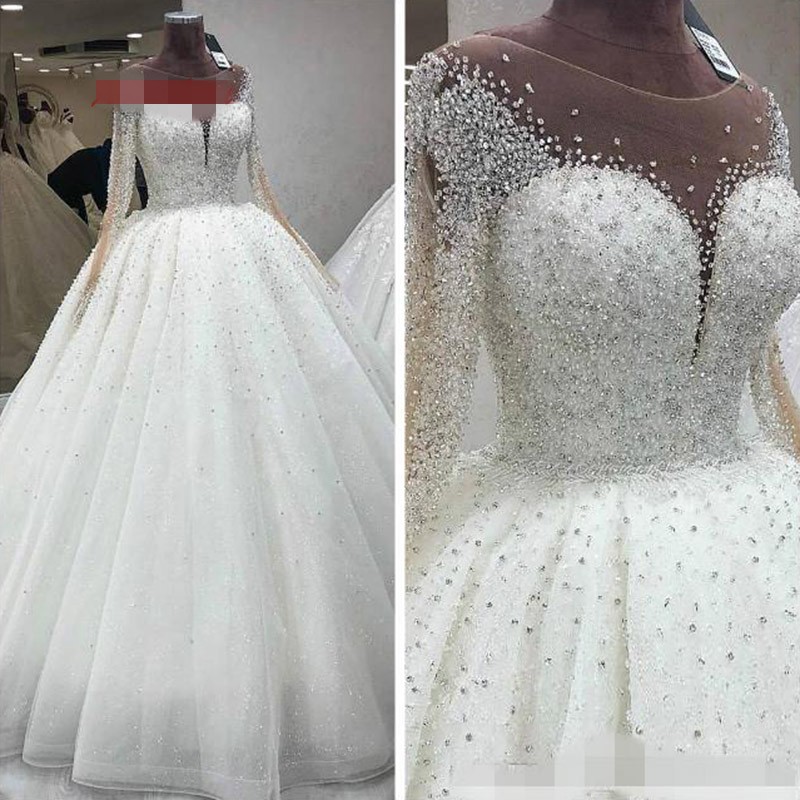 

2021 Luxurious Beaded Crystal Wedding Dresses Princess With Illusion Long Sleeves White Tulle Sheer Neckline Hollow Back Ball Gown Vestidos, Silver