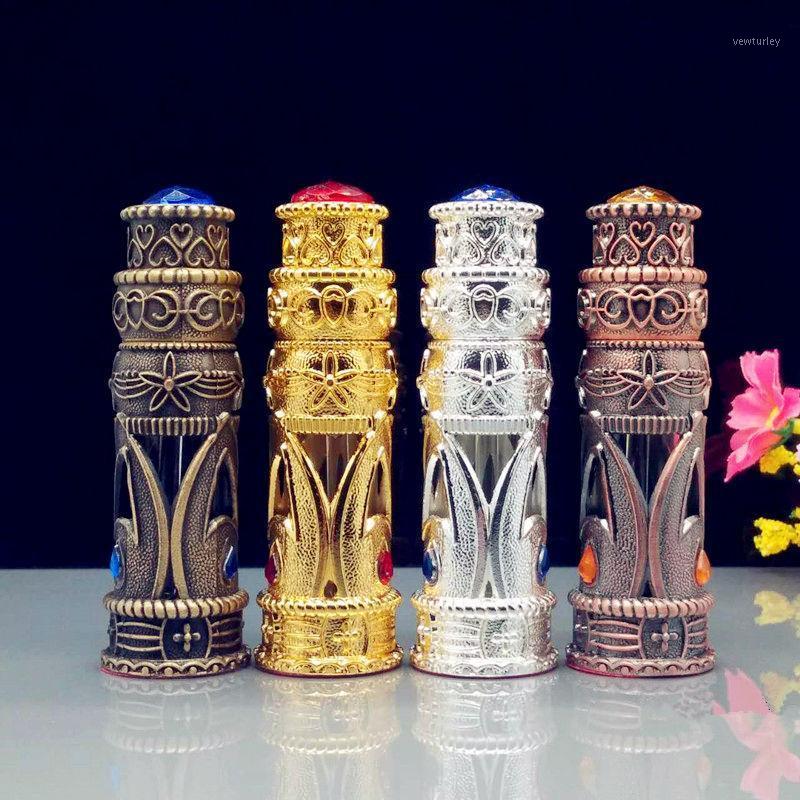 

5ml Small Alloy Perfume Bottle Dropper Essential Oil Vials Vintage Mini Bronze Cosmetic Sample Container Craft Decoration Gift1