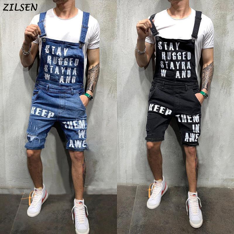 

2019 new Men' Hole Pocket Jeans Overalls Streetwear Suspender Pants Letter Printed Jumpsuit For Male plus Size1