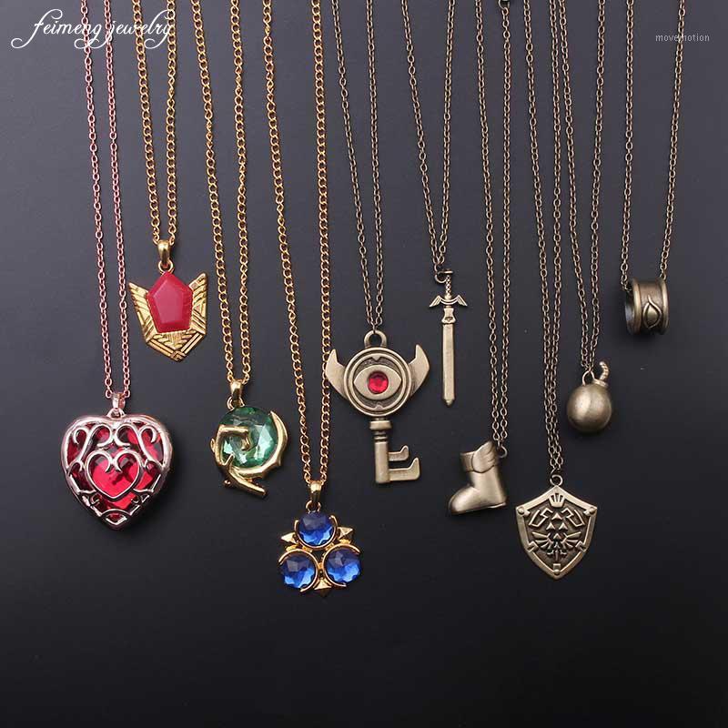 

2020 Fashion Jewelry The Zelda Shield Legend Heart Shaped Crystal Necklace Alloy Gold Frame Love Hallow Necklaces & Pendants1