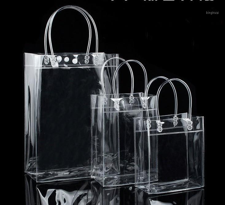 

10pcs PVC plastic gift bags with handles plastic wine packaging bags clear handbag party favors bag Fashion PP With Button1