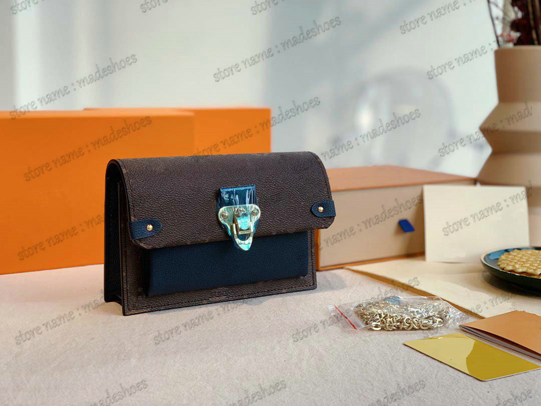 

Vavin Chain Wallet Mini Wallet On Chain Shoulder Bag WOC Handle Bags Luxurys Deisgner Womens Monograms Canvas Leather CrossBody Trunks Lock Flap