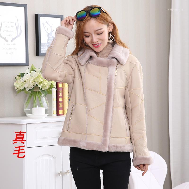 

new winter 2021 locomotive clothing fur coat female brief paragraph splicing long-sleeved lambs wool leather coat1, Black