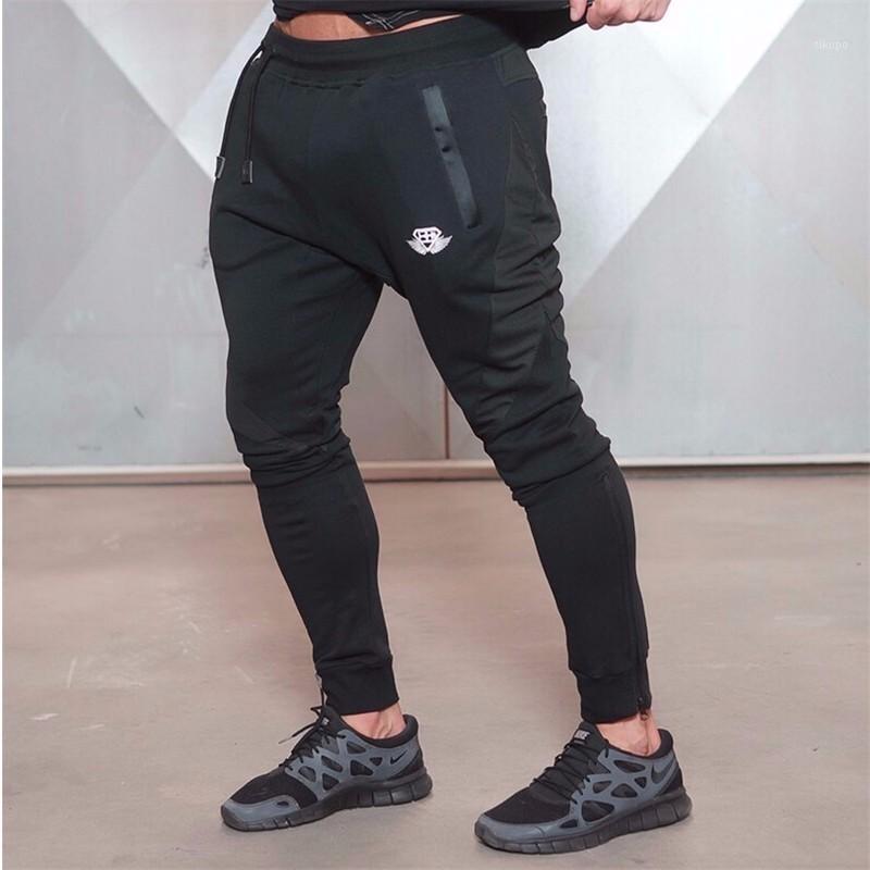 

Wholesale-2016 New Gold Medal Fitness Pants, Stretch Cotton Men's Fitness Pants Pants Body Engineers Jogger Fitness1