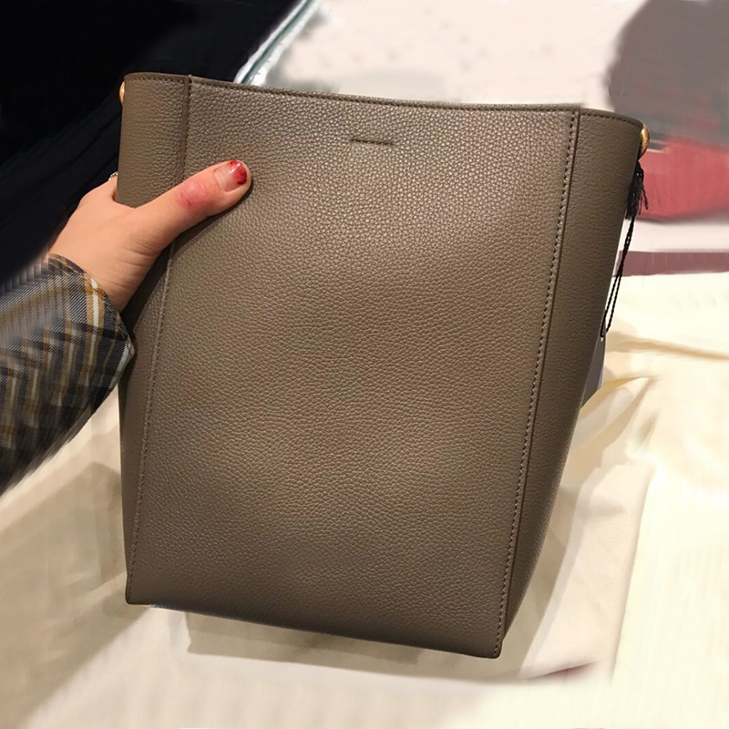 

2020 Spring and Summer New Wide Shoulder Strap Cowhide Bucket Bag Womens Leather Bags S All-Matching Simple One-Shoulder Crossboby Bag, Apricot color-small (spot goods) hot sal