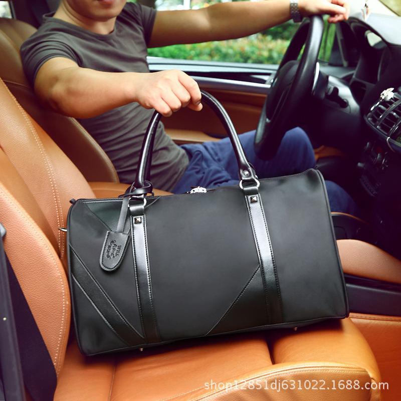 

Male Waterproof Oxford Large Capacity Mobile Travel Bag Business Travel Light and Short Package Fashion Shoulder Luggage1, Small black
